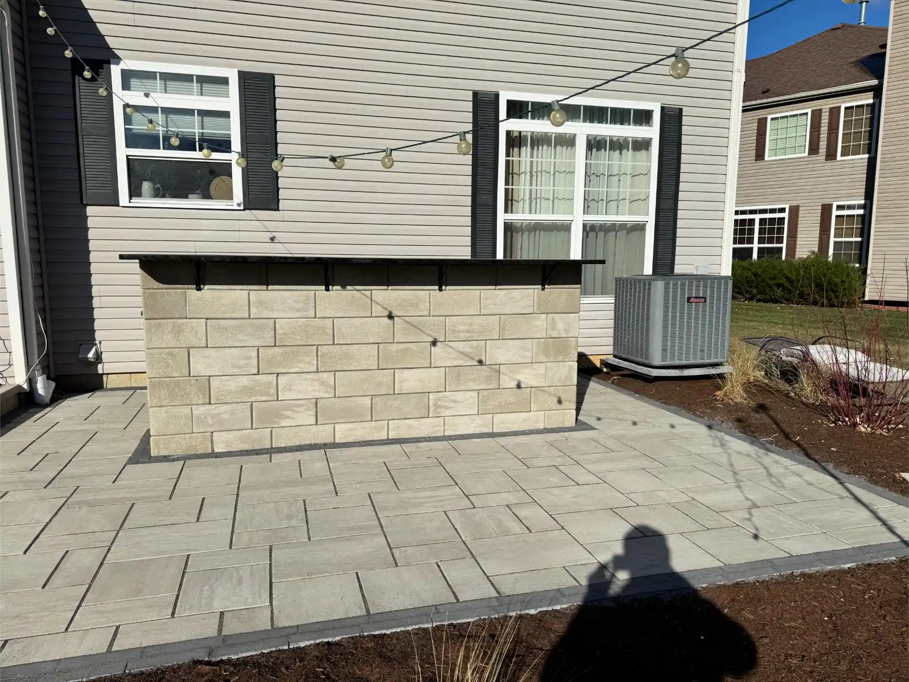 English Ln Project: Paver Patio, Seat Walls, Privacy Planting (photo 7 of 9)