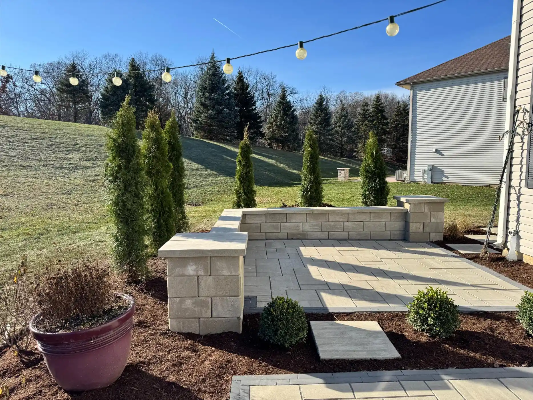 English Ln Project: Paver Patio, Seat Walls, Privacy Planting (photo 9 of 9)